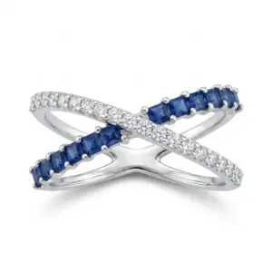 White 14k Sapphire Ring With   0.80tw Baguette Sapphire and   0.23tw Round Shape Diamond